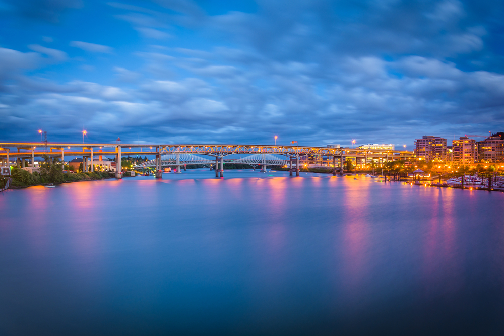 View of bridges over the Williamette River at twilight, in Portland, Oregon.